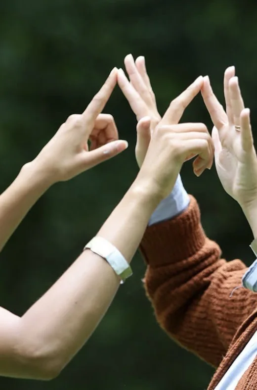 Close-up of hands during an outdoor exercise